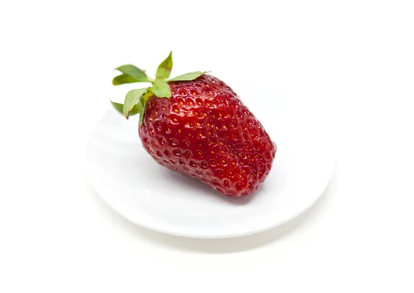 Fresh strawberry on a plate isolated on white background — Stock Photo, Image