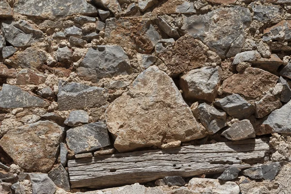 Muur van grote stenen structuur basalt. Goede achtergrond voor behang. — Stockfoto