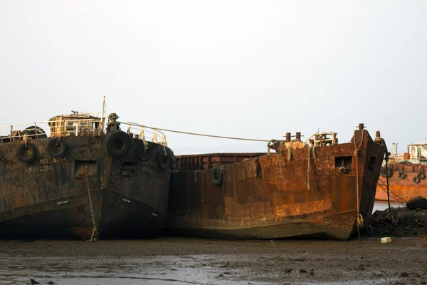 The parking of the old cargo ships stand. Cemetery of the old ships India, Goa
