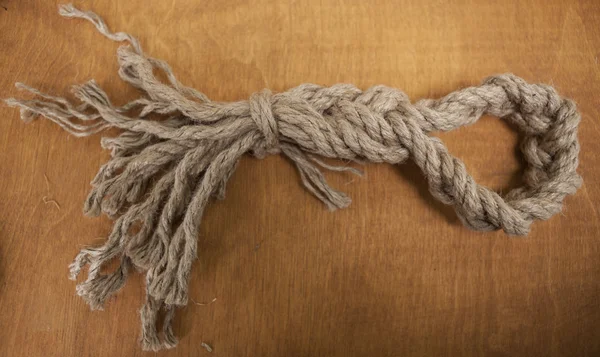 Beautiful knot of a strong rope — Stock Photo, Image