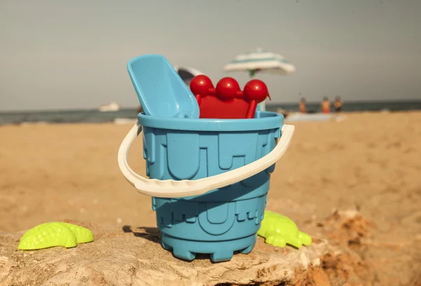 Sand toys on the beach of Lake . — Stock Photo, Image