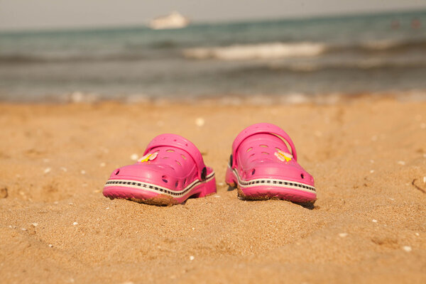 Flip-flop  on sand beach of Lake Balaton