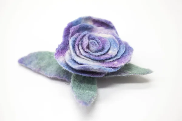 Beautiful blue rose flower milled wool on a white background. — 스톡 사진