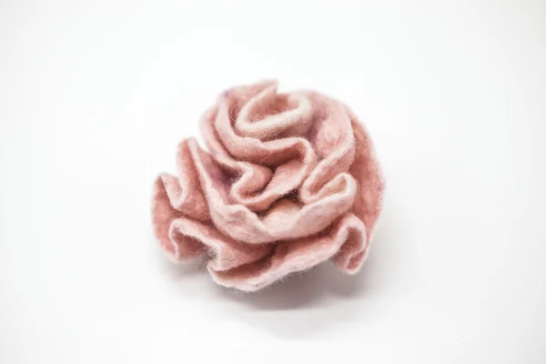 Beautiful pink rose flower milled wool on a white background. — 图库照片