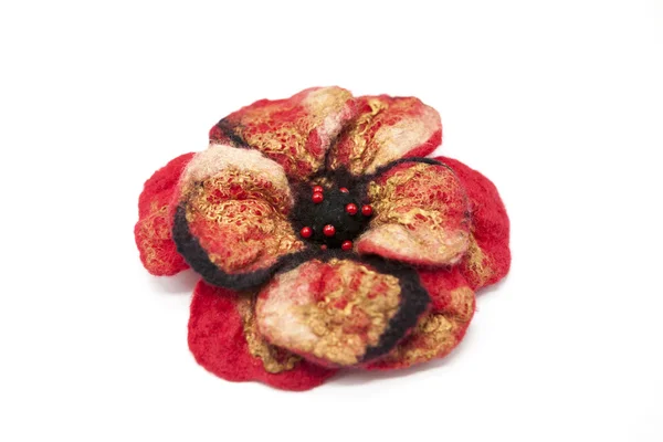 Beautiful red rose flower milled wool with beads on a white background. — 图库照片