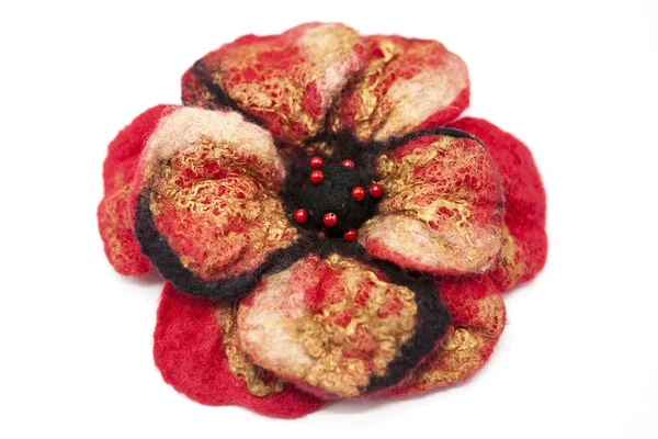 Beautiful red rose flower milled wool with beads on a white background. — 스톡 사진