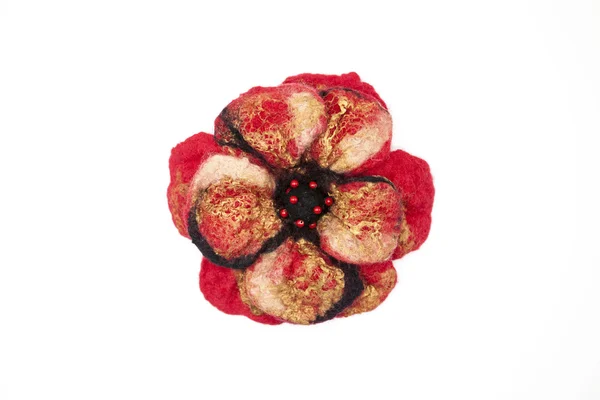 Beautiful red rose flower milled wool with beads on a white background. — 图库照片