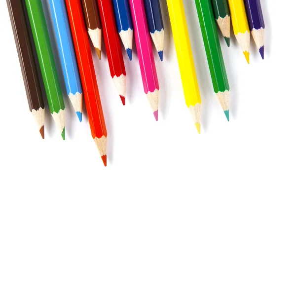 Beyaz arkaplanda izole edilmiş renkli kalemler yakın plan Stok Fotoğraf