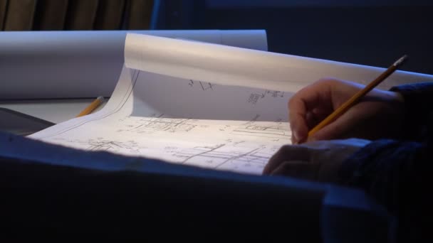 Engineer checks the construction drawings — Stock Video