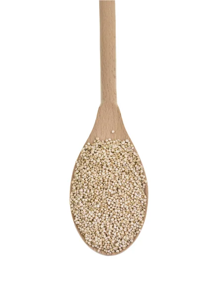 Quinoa em uma colher de madeira — Fotografia de Stock