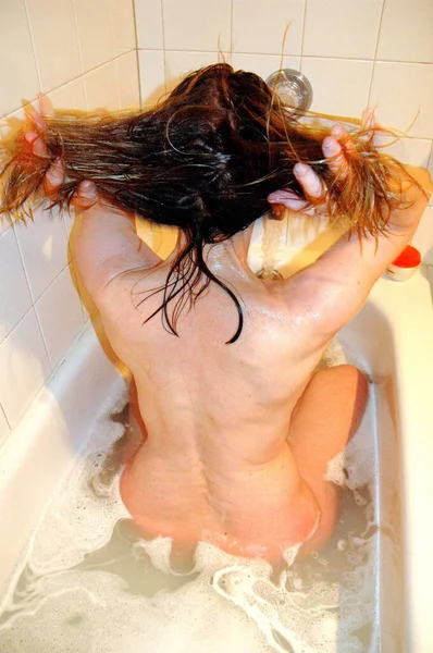 Mature Female Adult Beauty Sitting Bath Tub Washing Her Hair Stock Image