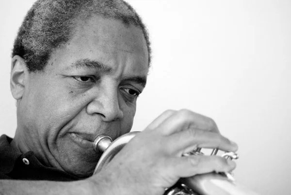 Jazz musician blowing. — Stock Photo, Image
