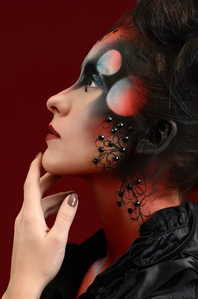 Hübsches Mädchen mit kreativer Kunst Make-up — Stockfoto