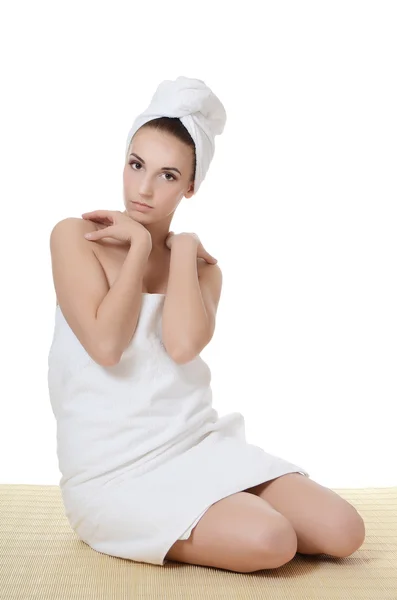 Beautiful woman in a towel — Stock Photo, Image