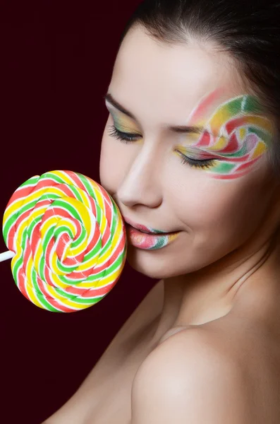 Frau mit Zuckerbonbons — Stockfoto