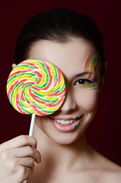 Donna con zucchero caramelle — Foto Stock