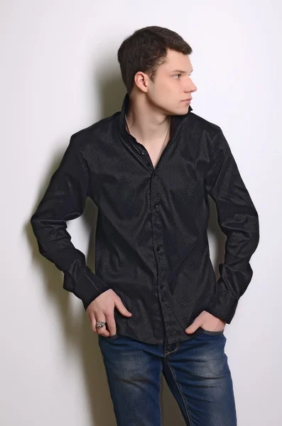 Young man in black shirt — Stock Photo, Image