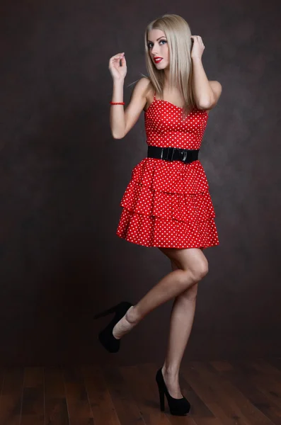 Beautiful sensual woman in red dress — Stock Photo, Image