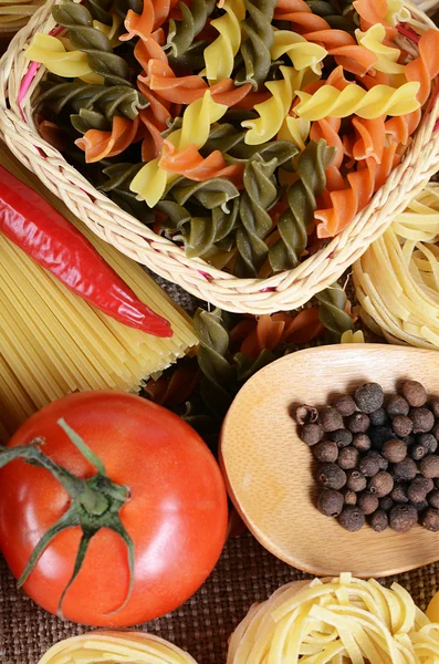 Pasta with peppercorns and tomatoes — Stock Photo, Image