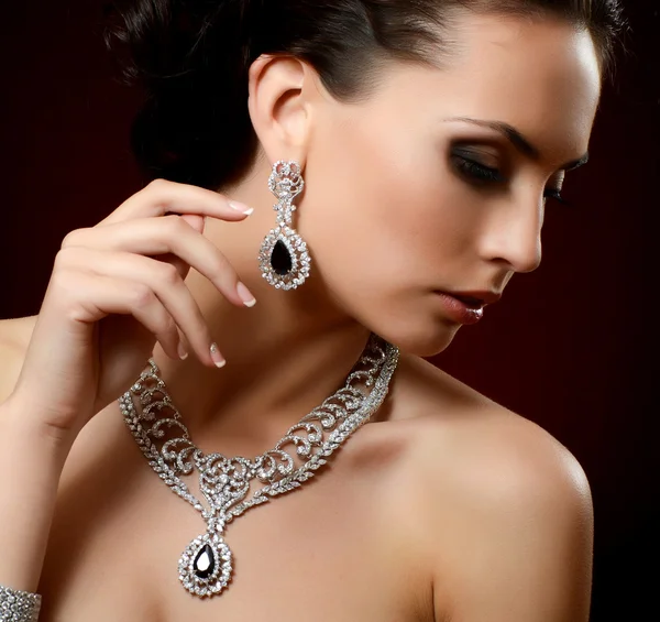 Woman in expensive pendant and earring — Stock Photo, Image