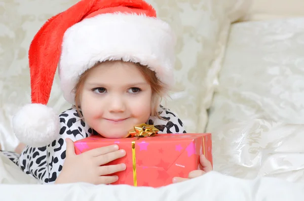 Little girl in Santa hat — Stock Photo, Image