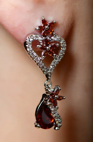 Female ear with jewelry earring — Stock Photo, Image