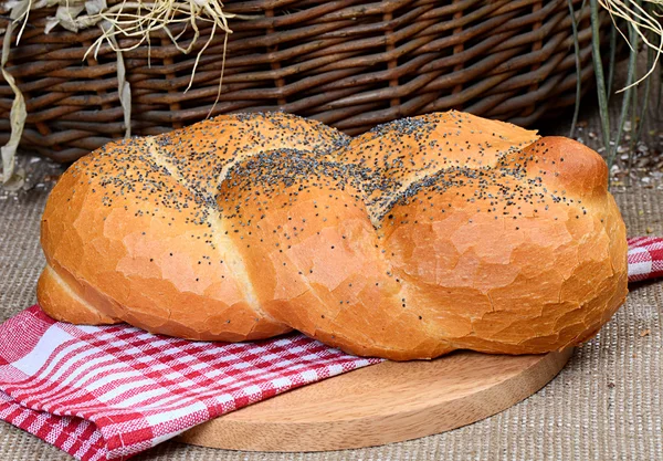 Wheaten long loaf with poppy — Stock Photo, Image