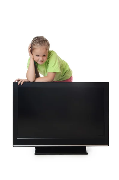 Petite fille à la recherche tv — Photo