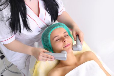 Yordam vibro hücreli Elektroterapi.