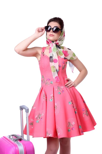 Pinup sexig tjej med rosa resväska. — Stockfoto