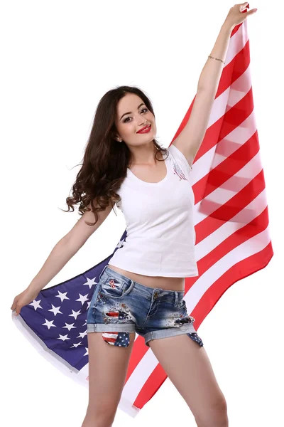 Sexy junge Frau posiert über amerikanischer Flagge Hintergrund — Stockfoto