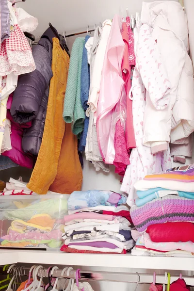 Wardrobe with child clothes — Stock Photo, Image