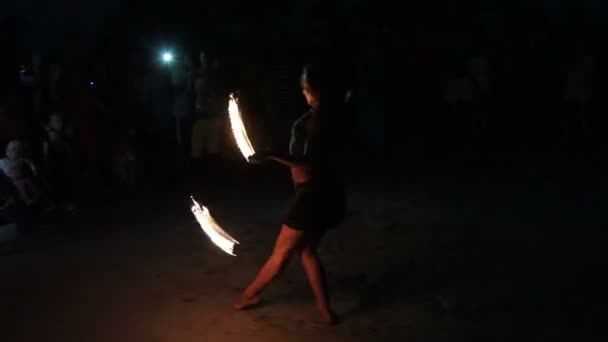 Unidentified woman do fire show amazing at night — Stock Video