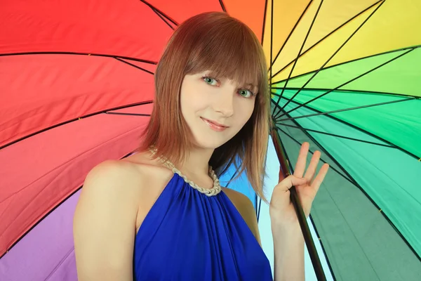 Fashion blondie posing with color umbrella — Stock Photo, Image