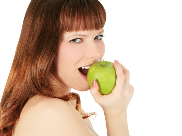 Donna che mangia una mela verde isolata su sfondo bianco — Foto Stock