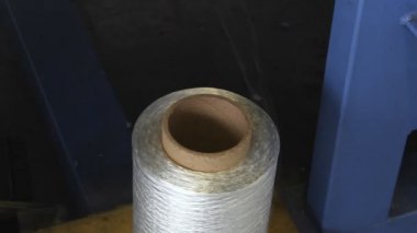Bir fabrika makinesinde iplik Tekstil Sanayi - iplik biriktirir