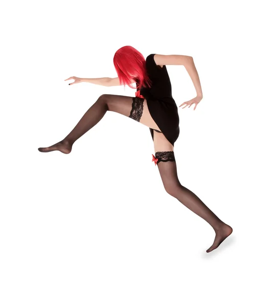 Картина жінки червоного волосся в чорних панчохах позує — стокове фото