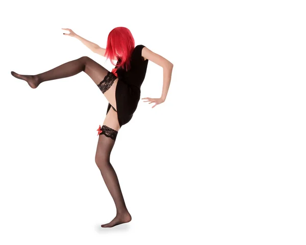 Image de femme aux cheveux roux en bas noirs posant — Photo
