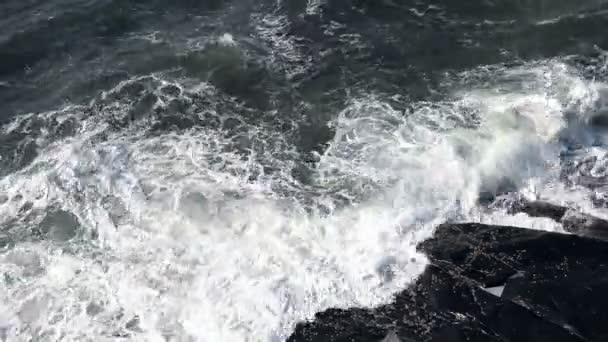 Waves touching stone at stormy day — Stock Video