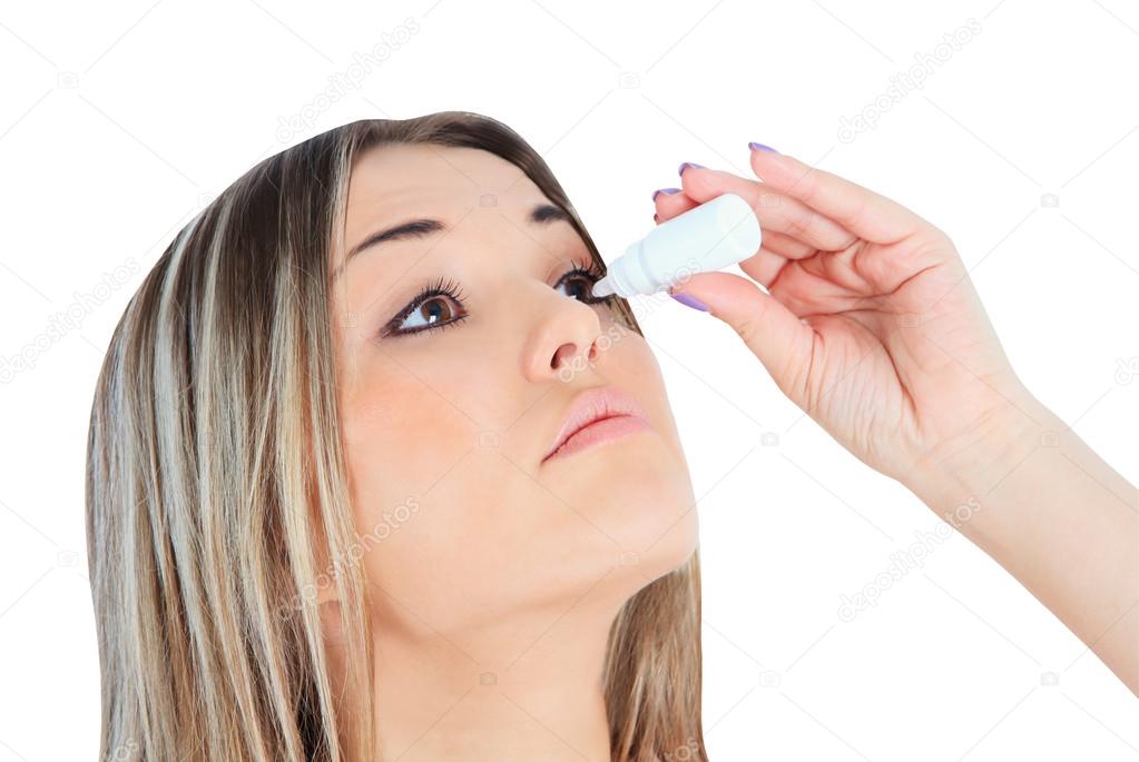 woman dripping eye with eyes drops
