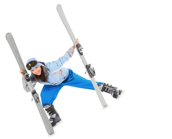 Junges Mädchen in Sportbekleidung mit Ski isoliert über weiß — Stockfoto