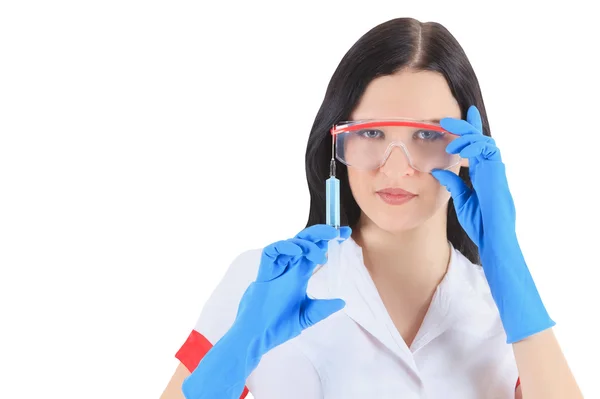 Female doctor with syringe over white — Stock Photo, Image