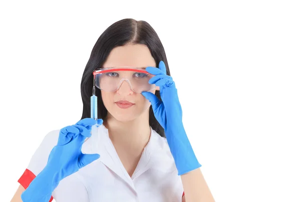 Female doctor with syringe over white — Stock Photo, Image