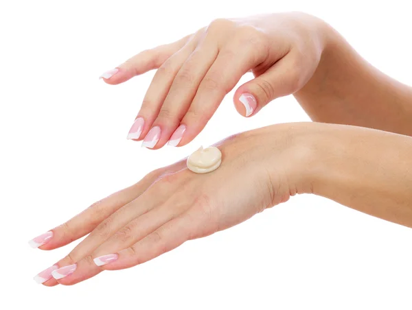 Woman hands with perfect manicure applying moisturizer cream — Stock Photo, Image