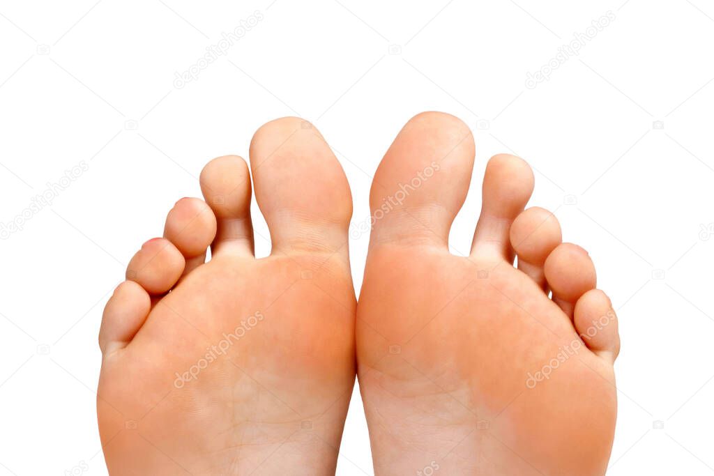 Closeup shot of female feet, isolated on white background
