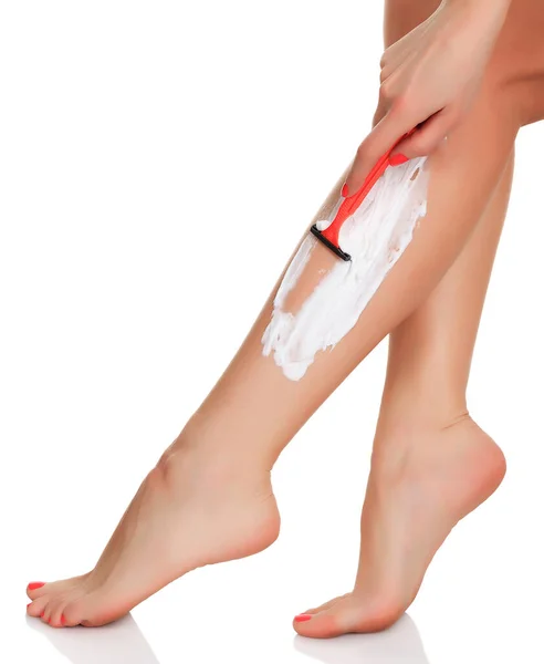 Woman Shaves Her Legs Isolated White Copyspace — Stock Photo, Image
