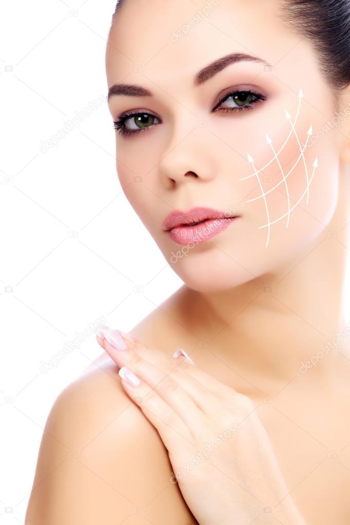 Young female with clean fresh skin, white background