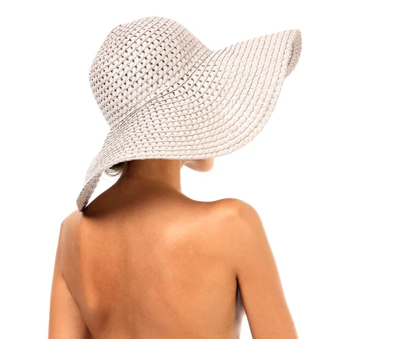 Mujer desnuda en un sombrero de sol, aislada sobre fondo blanco —  Fotos de Stock