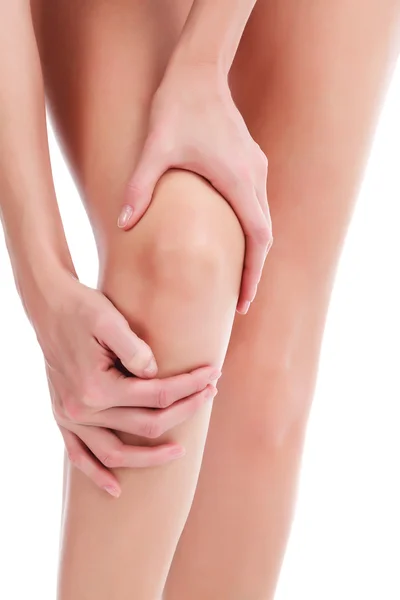 Mulher com lesão na perna, isolado em fundo branco, copyspace — Fotografia de Stock