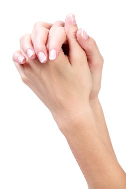 Beyaz arka planda izole edilmiş, bakımlı kadın elleri.